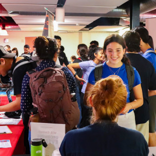 A color photo showing a group of people at a recent event.